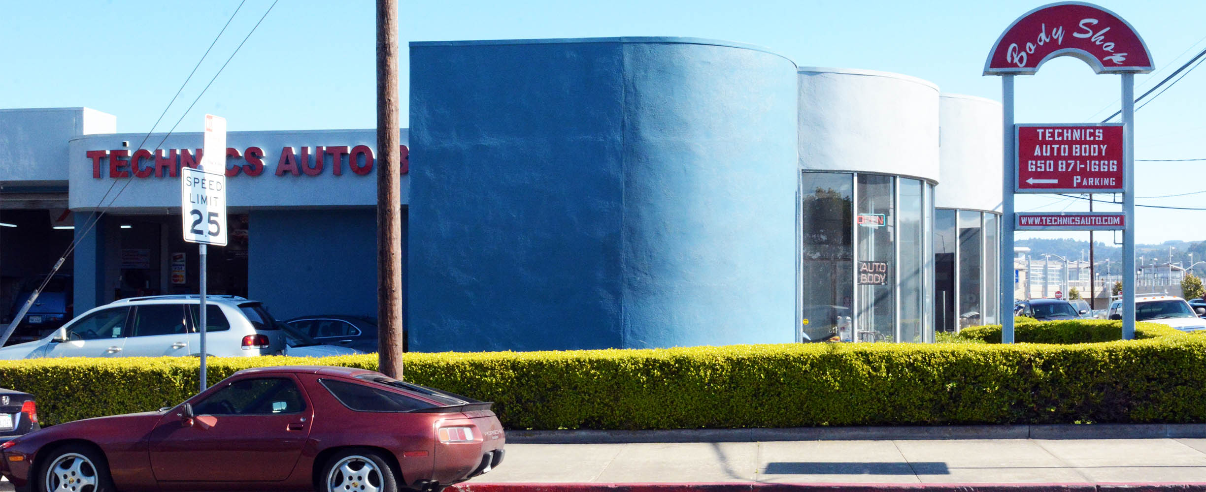 Auto body shop with large paint booth and body repair facilities. 